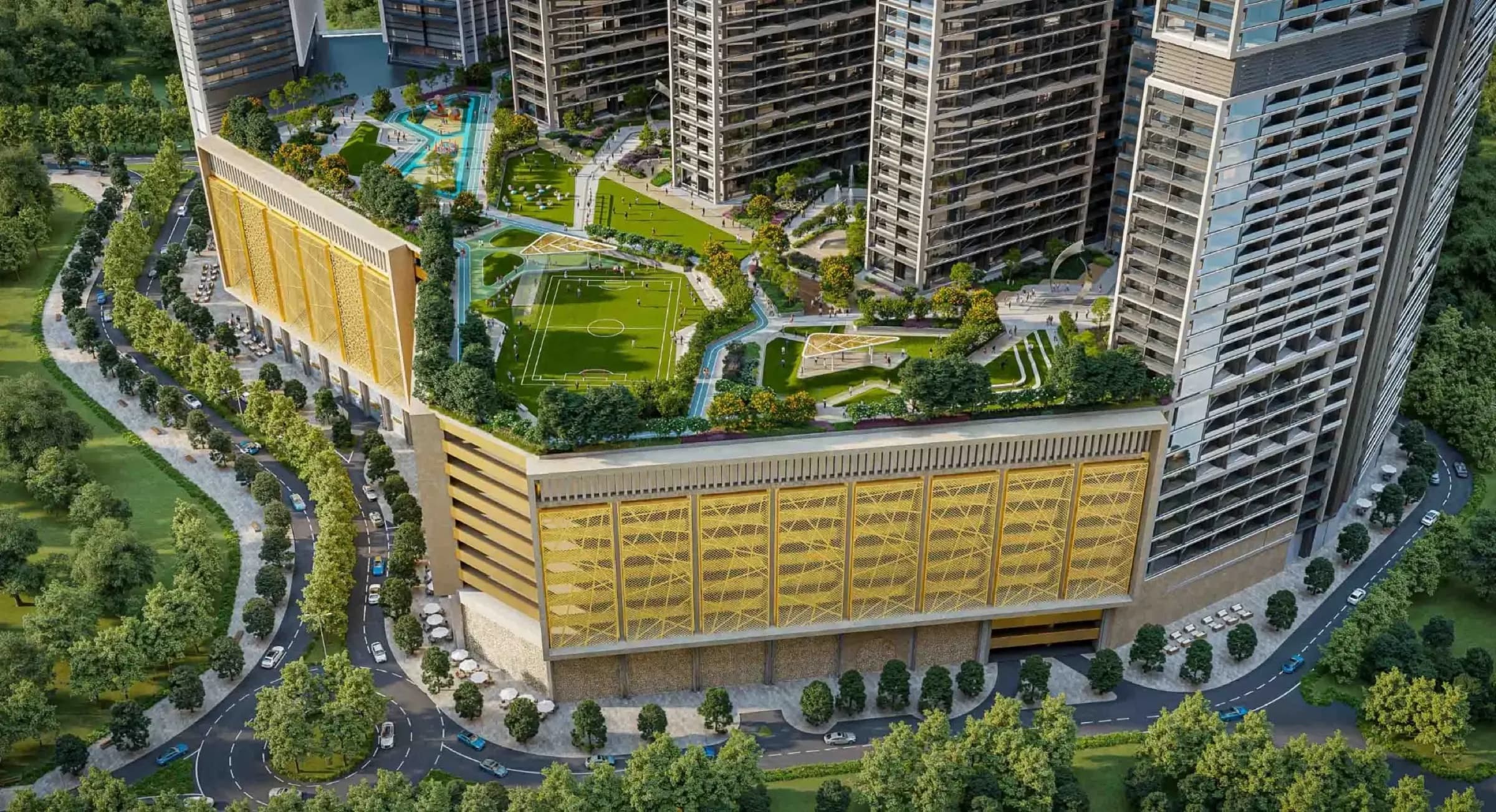 Sobha Central podium amenity deck with football pitch, playground and landscaped gardens