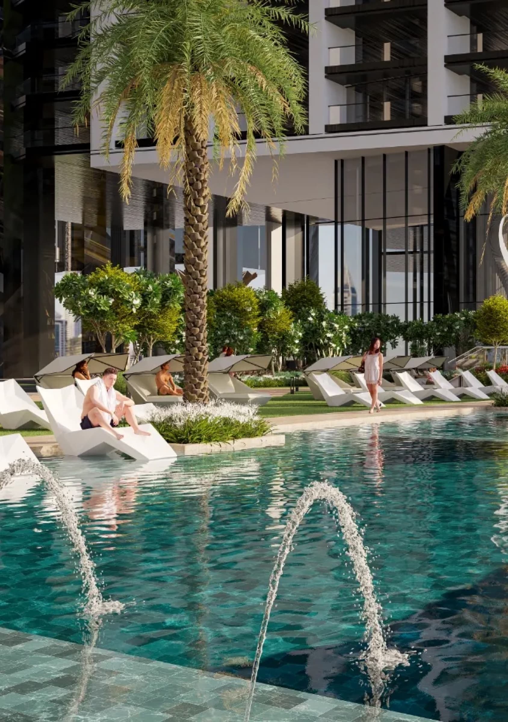 Sobha Central resident pool deck with mature palms and water features